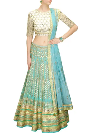 Aqua color Bridal Lehenga with white Choli