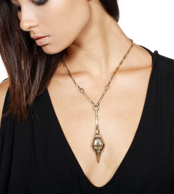 bird of paradise pendulum necklace brass